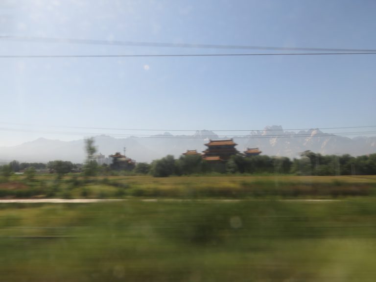 Photo: Lukas Knoflach. A landscape flying past the window, on the high-speed train from Xi’an to Beijing.